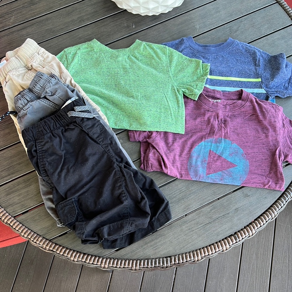 Size 6/7 - 3 cat and jack shirts. 4 pairs of shorts